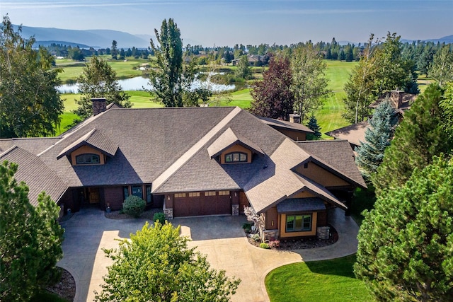 bird's eye view featuring a water and mountain view