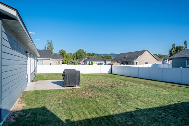 view of yard with a patio area