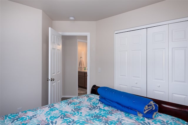 bedroom featuring a closet and carpet floors