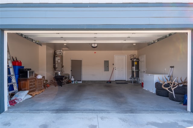 garage with a garage door opener, heating unit, electric panel, and secured water heater