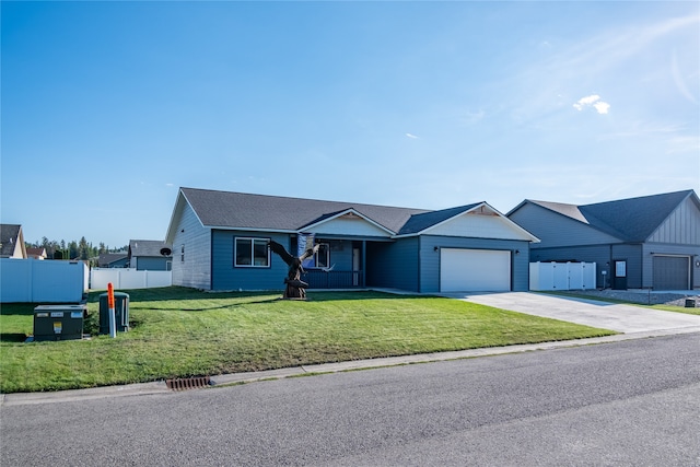 ranch-style house with a garage and a front yard