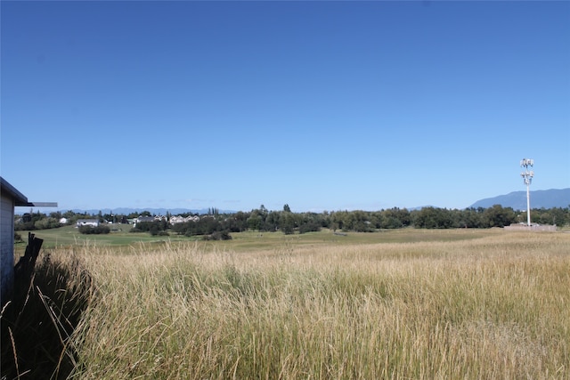 view of local wilderness featuring a mountain view and a rural view