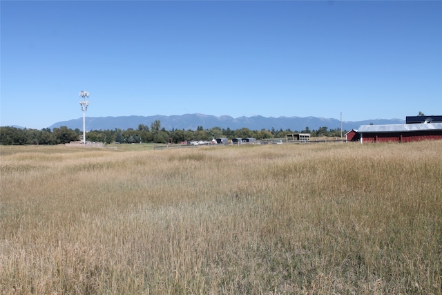 view of mountain feature with a rural view