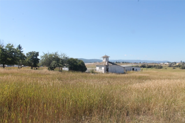 exterior space with a rural view