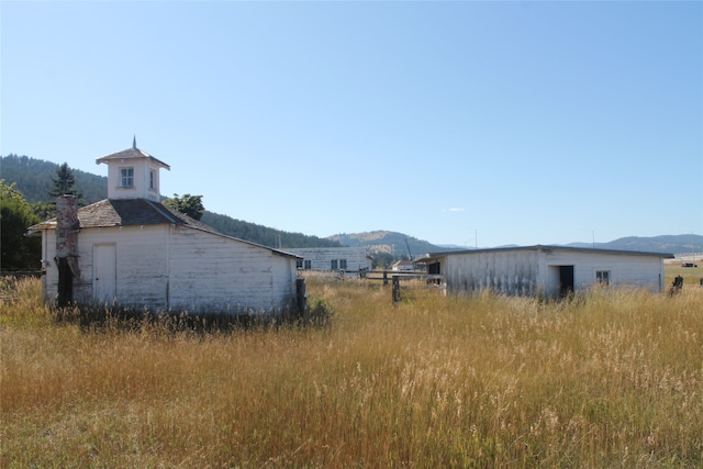 view of home's exterior featuring a mountain view