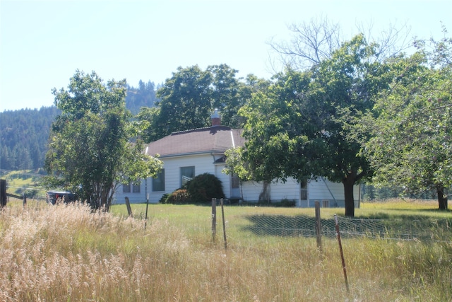 exterior space featuring a front yard