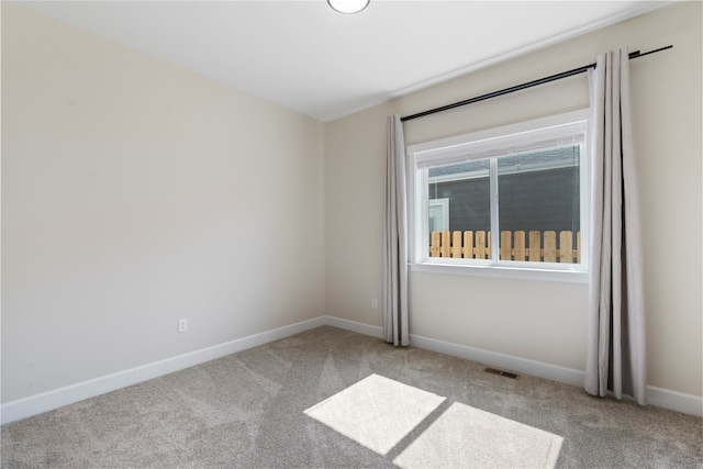 view of carpeted spare room