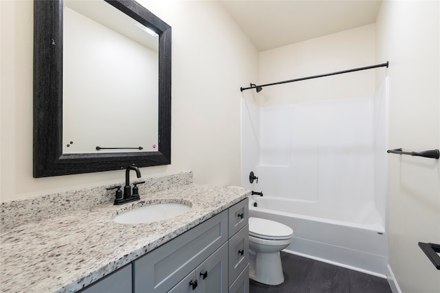 full bathroom with vanity, toilet,  shower combination, and hardwood / wood-style flooring