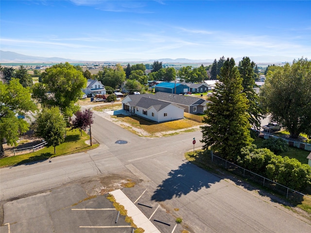 drone / aerial view featuring a mountain view