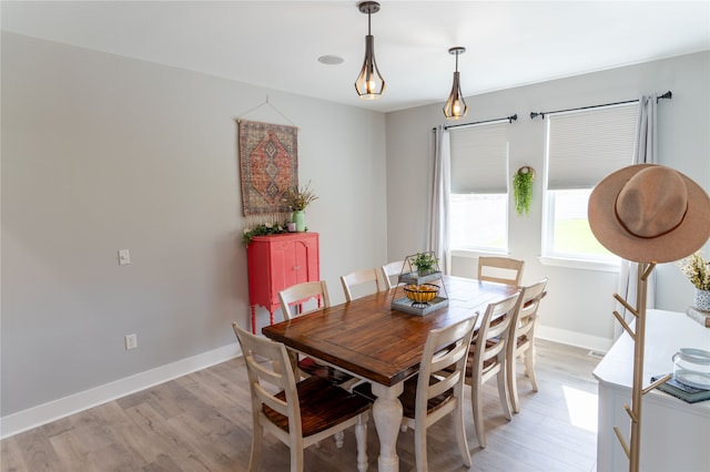 dining space featuring light hardwood / wood-style flooring