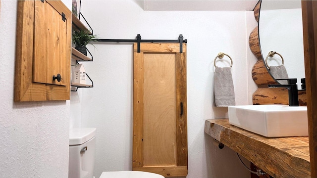 2100 Four Mile Way, Kalispell, MT 59901 - bathroom featuring a textured wall