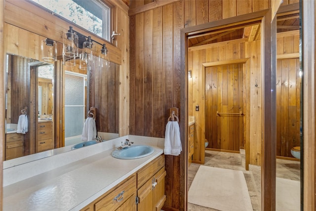 2100 Four Mile Way, Kalispell, MT 59901 - bathroom featuring wood walls and vanity