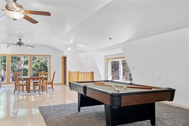 2100 Four Mile Way, Kalispell, MT 59901 - playroom featuring plenty of natural light, billiards table, ceiling fan, lofted ceiling, and light wood-type flooring