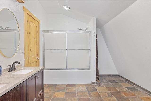 2100 Four Mile Way, Kalispell, MT 59901 - full bath with stone finish floors, combined bath / shower with glass door, double vanity, and lofted ceiling