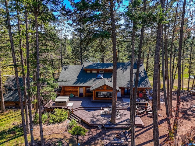 2100 Four Mile Way, Kalispell, MT 59901 - rear view of house with a wooden deck and log siding