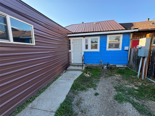 1327 Farrell St, Butte, MT 59701 - property entrance featuring metal roof