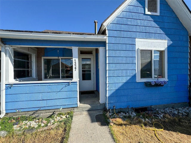 exterior space featuring covered porch