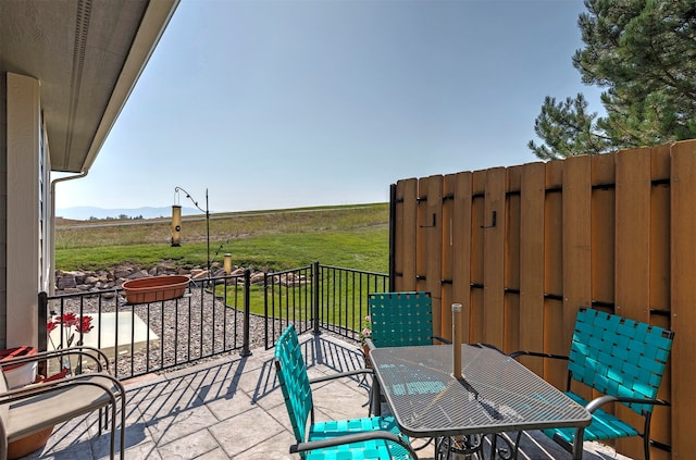 deck featuring a yard and a patio