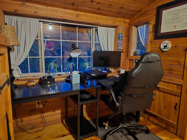 office with vaulted ceiling, hardwood / wood-style floors, wooden walls, and wooden ceiling