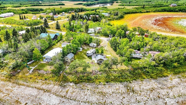 birds eye view of property with a rural view