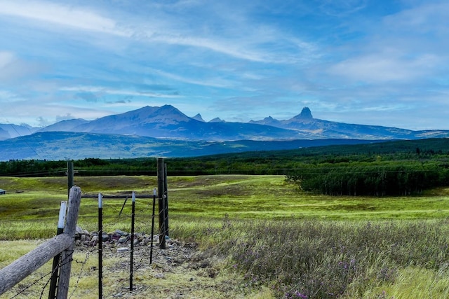 mountain view featuring a rural view