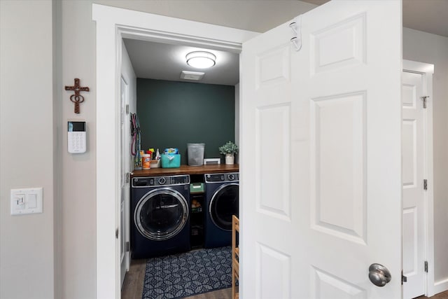 clothes washing area with laundry area and washing machine and clothes dryer