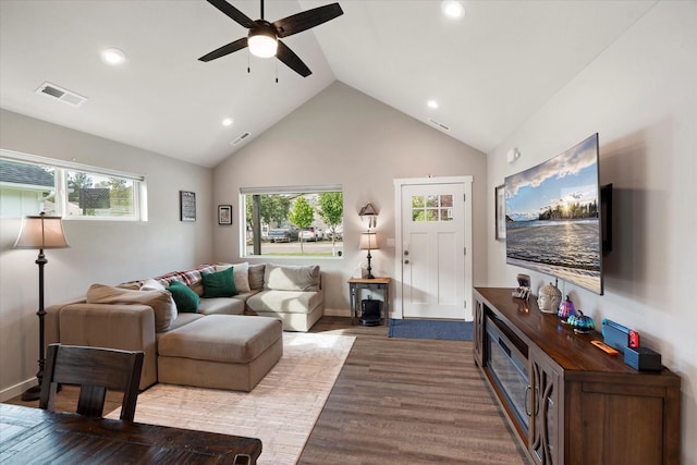 living area featuring a ceiling fan, visible vents, wood finished floors, and recessed lighting