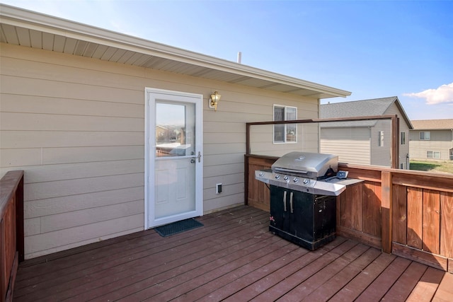 wooden deck with grilling area