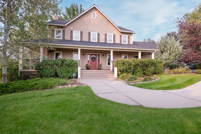 view of front of house featuring a front lawn and a porch