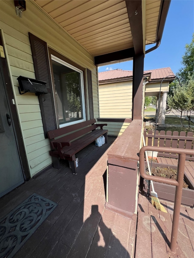 wooden terrace with covered porch