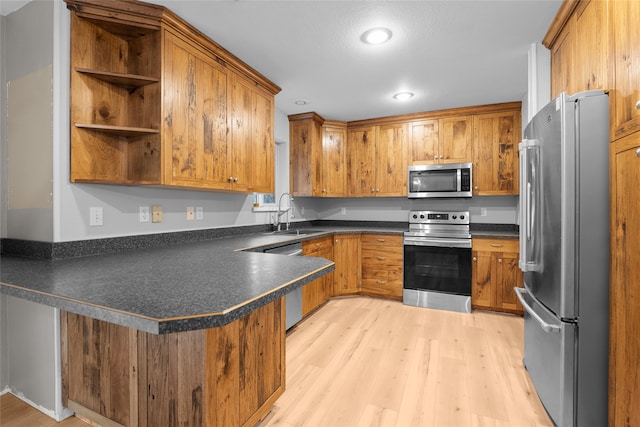 washroom featuring washer and clothes dryer, dark hardwood / wood-style floors, cabinets, and a textured ceiling