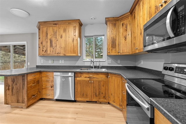 hallway with light hardwood / wood-style flooring