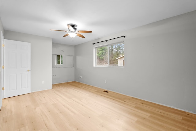 hallway with light wood-type flooring