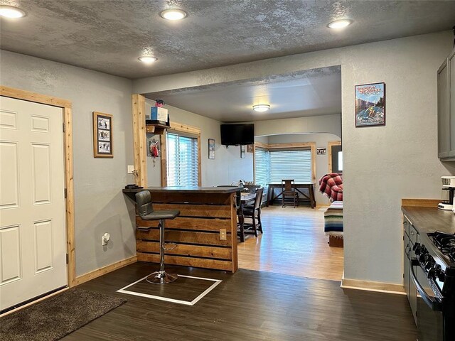 interior space with dark hardwood / wood-style flooring