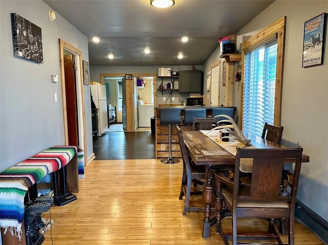 dining room featuring light hardwood / wood-style floors