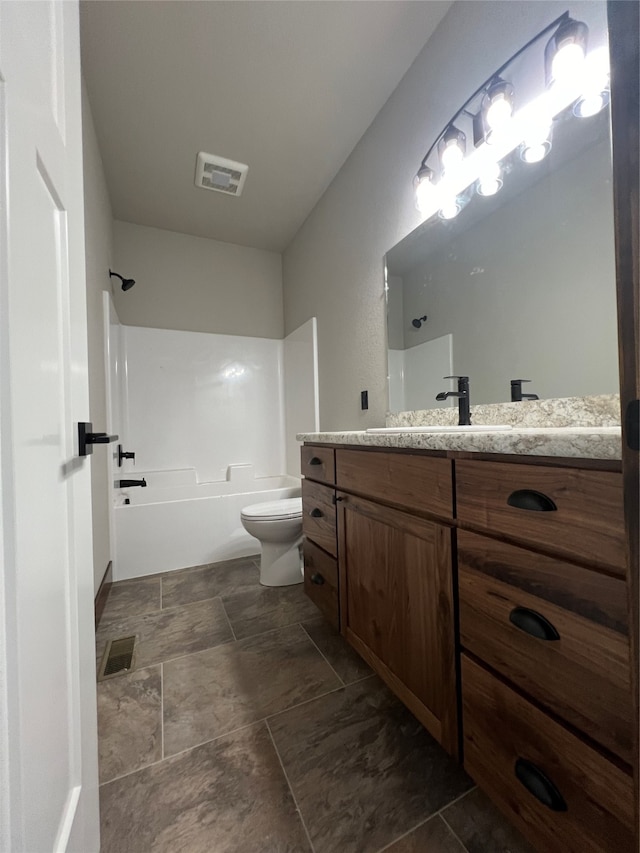 full bathroom with toilet, tub / shower combination, and vanity