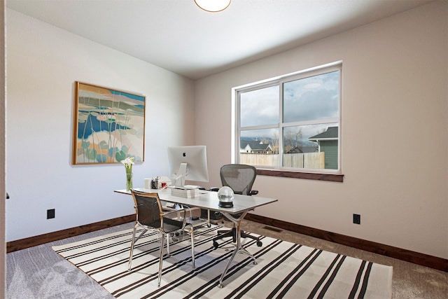 home office with carpet flooring and baseboards