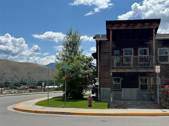 view of building exterior featuring a mountain view