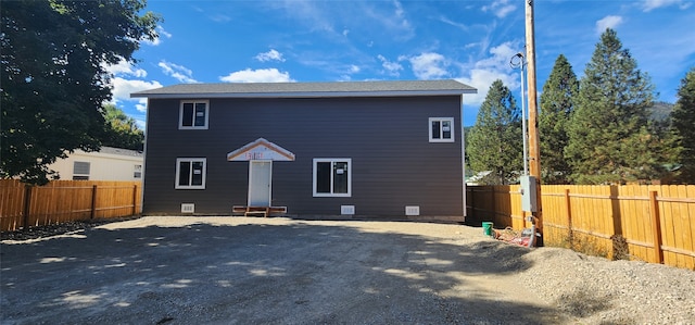 rear view of house with a patio