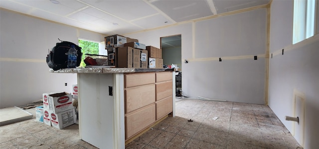 kitchen with light brown cabinetry