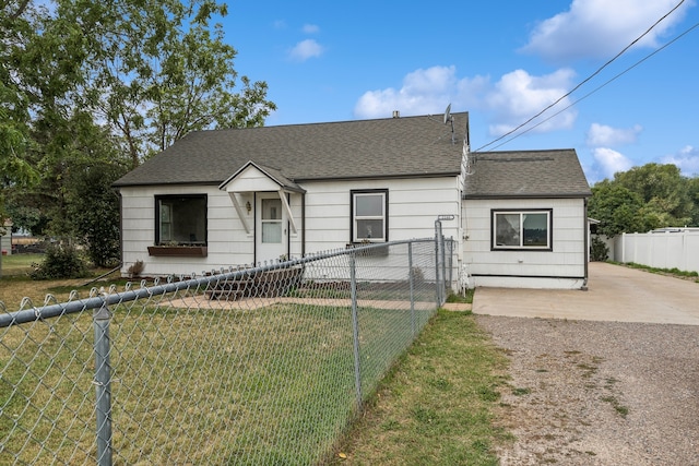 view of front of home with a front yard