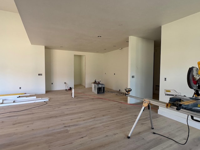 unfurnished living room featuring light wood-type flooring