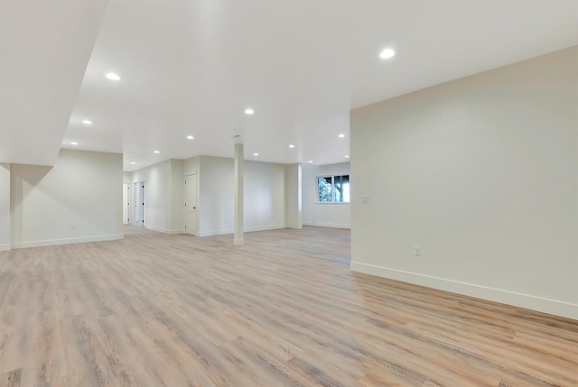 unfurnished living room with light wood-type flooring