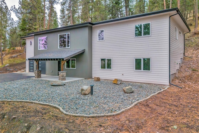 view of front of home featuring a patio area