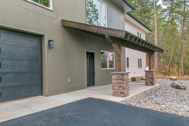 exterior space with a garage