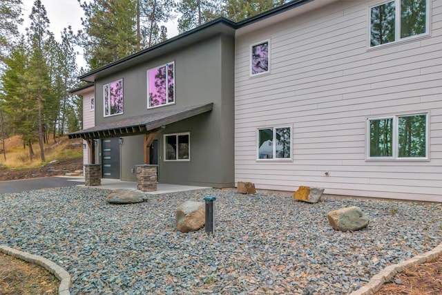 view of front of home with a patio area