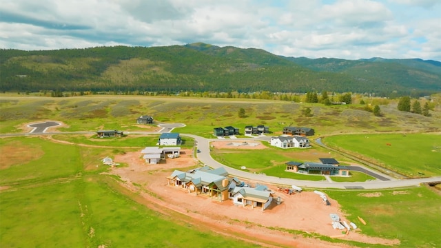 bird's eye view featuring a mountain view and a rural view