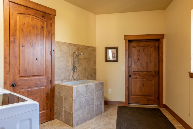 bathroom featuring tile patterned floors and plus walk in shower