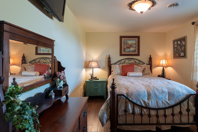 bedroom featuring hardwood / wood-style flooring