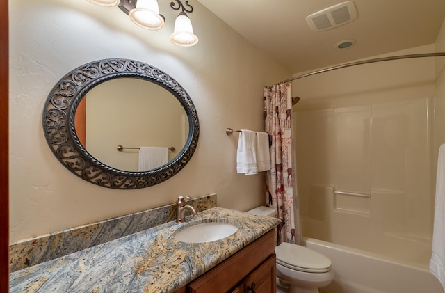 full bathroom featuring vanity, toilet, and shower / bath combination with curtain